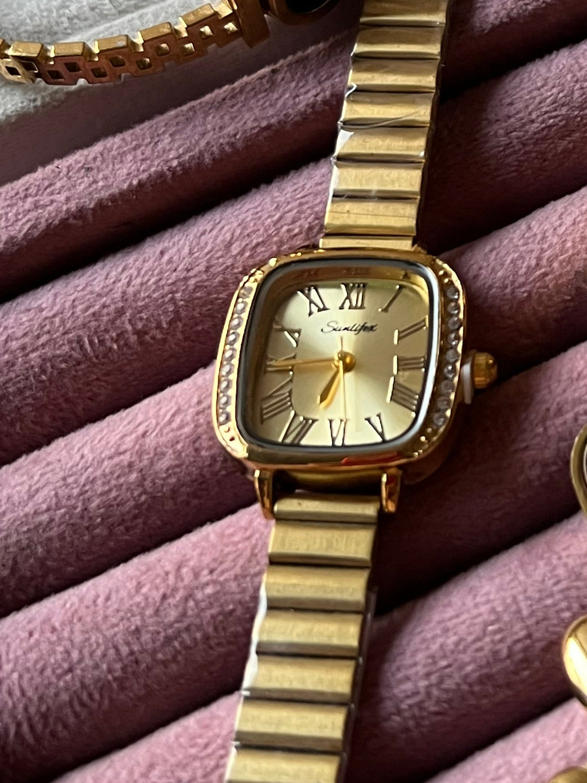 Suniflex golden watch