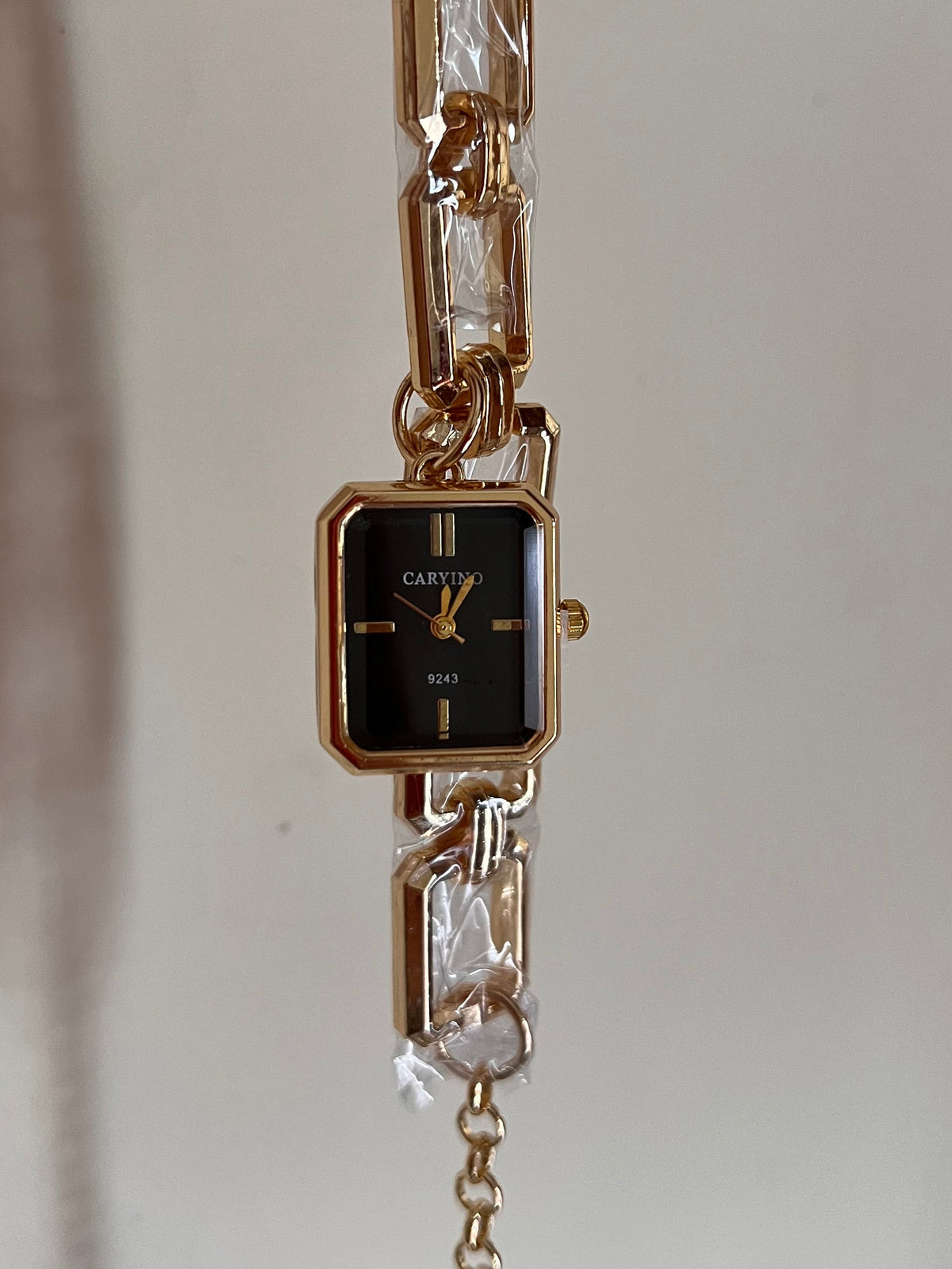 Black hanging dial watch