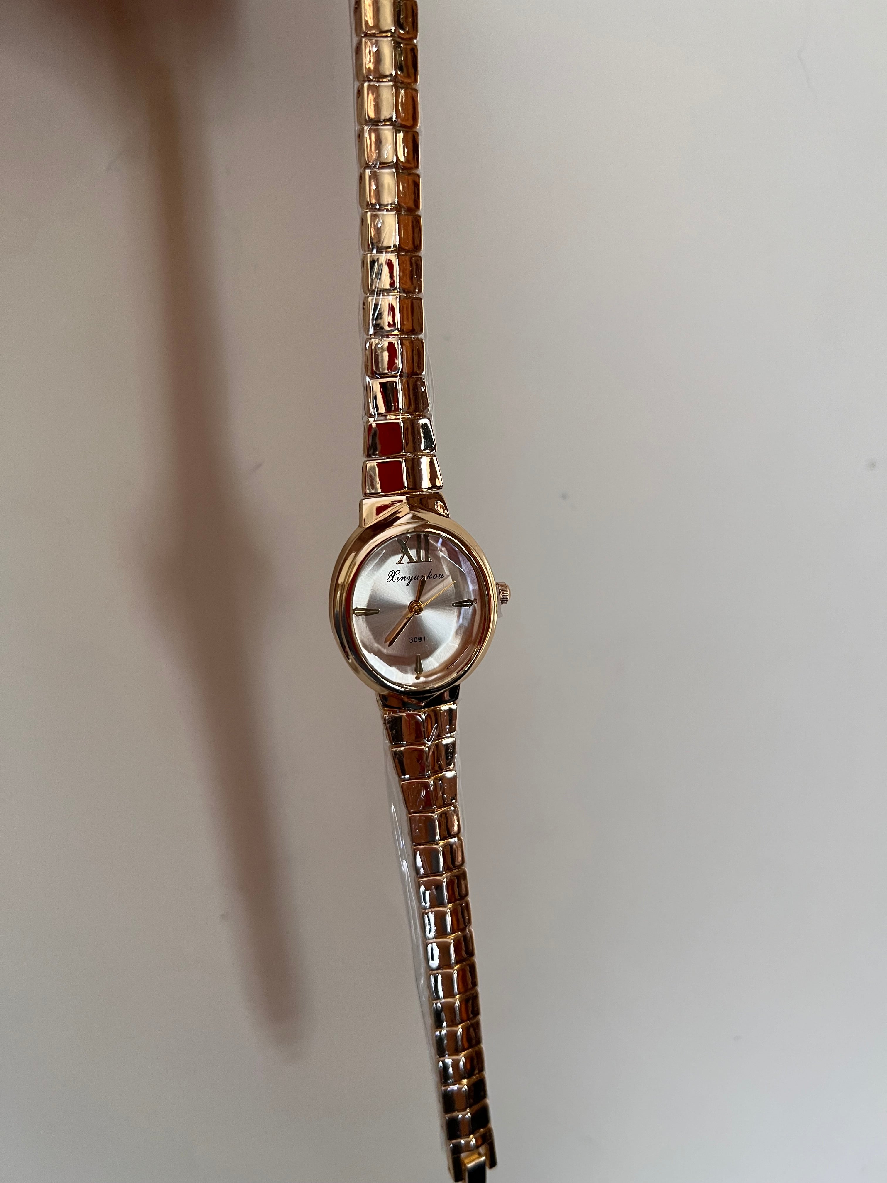 Oval shaped snake strap Watch