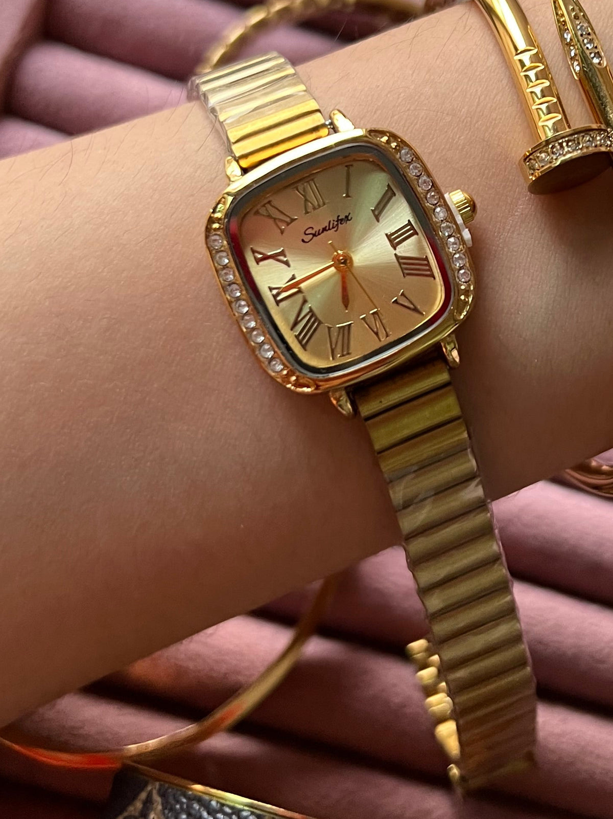 Suniflex golden watch