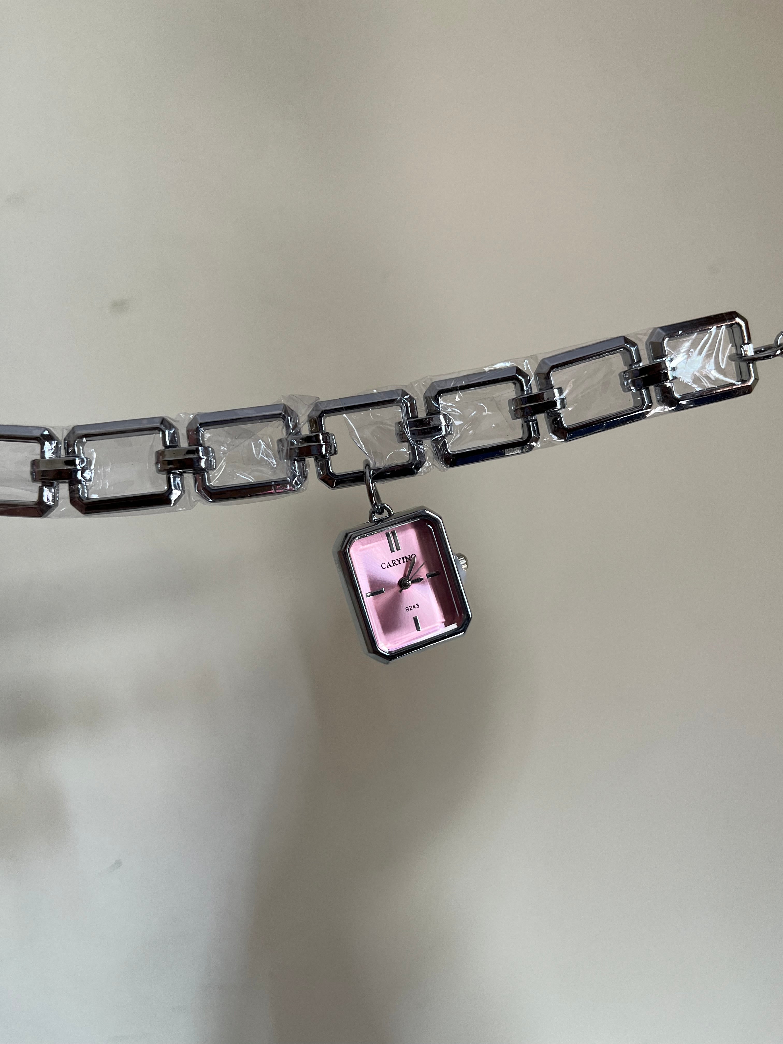 Hanging charm style pink dial with  silver bracelet Watch