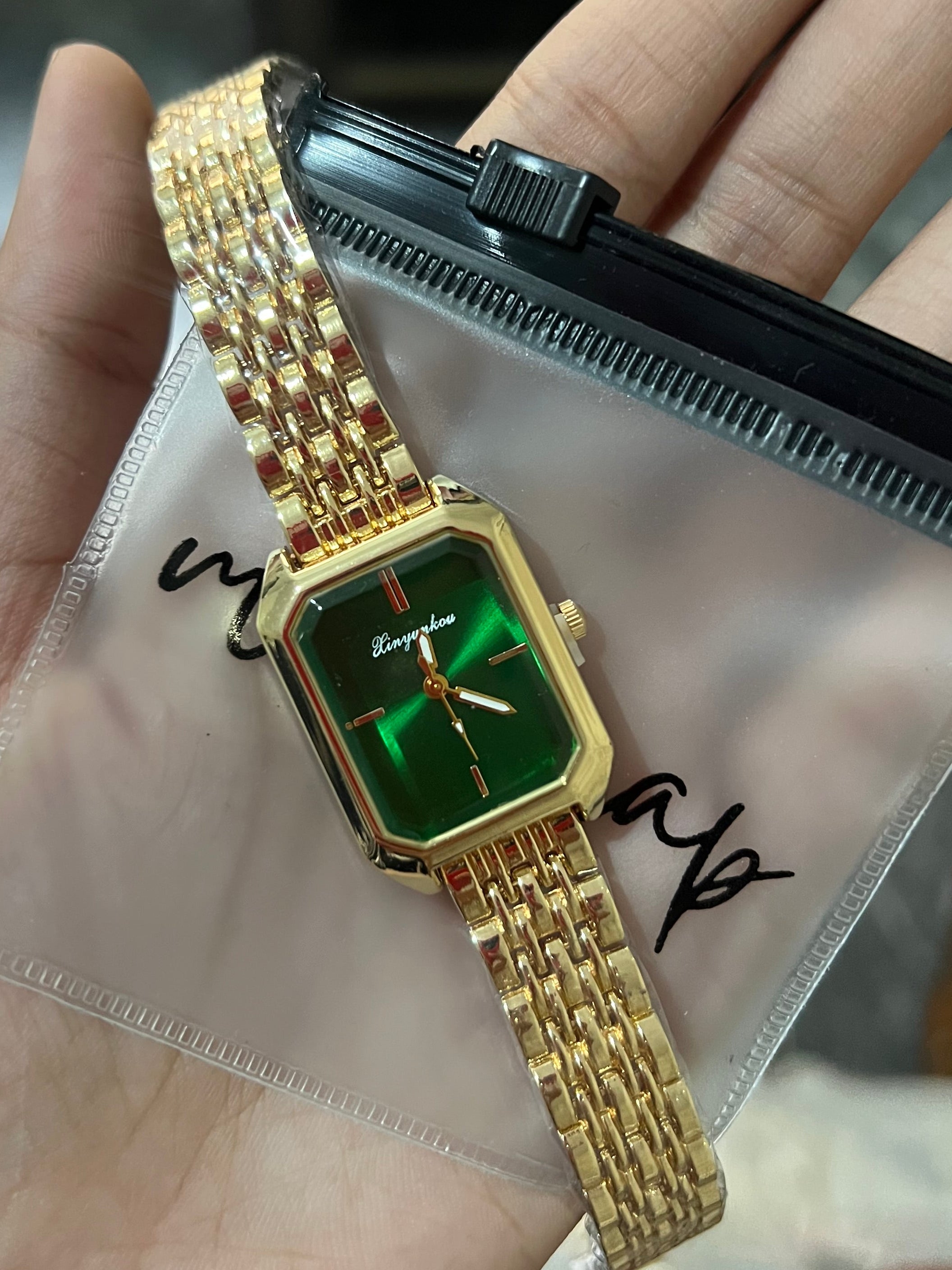 Green rectangular dial watch