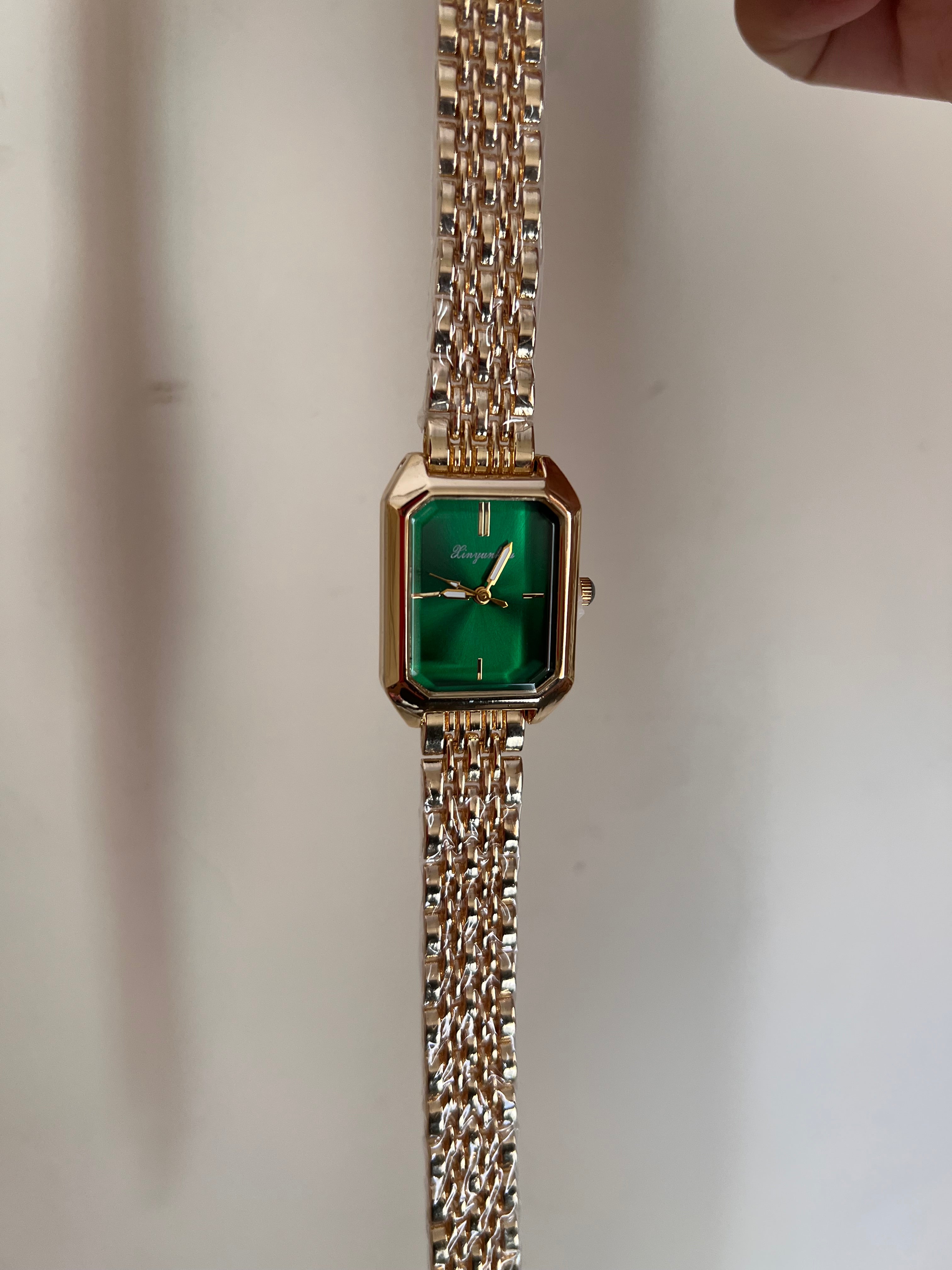 Green rectangular dial watch