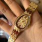Snake golden dial watch