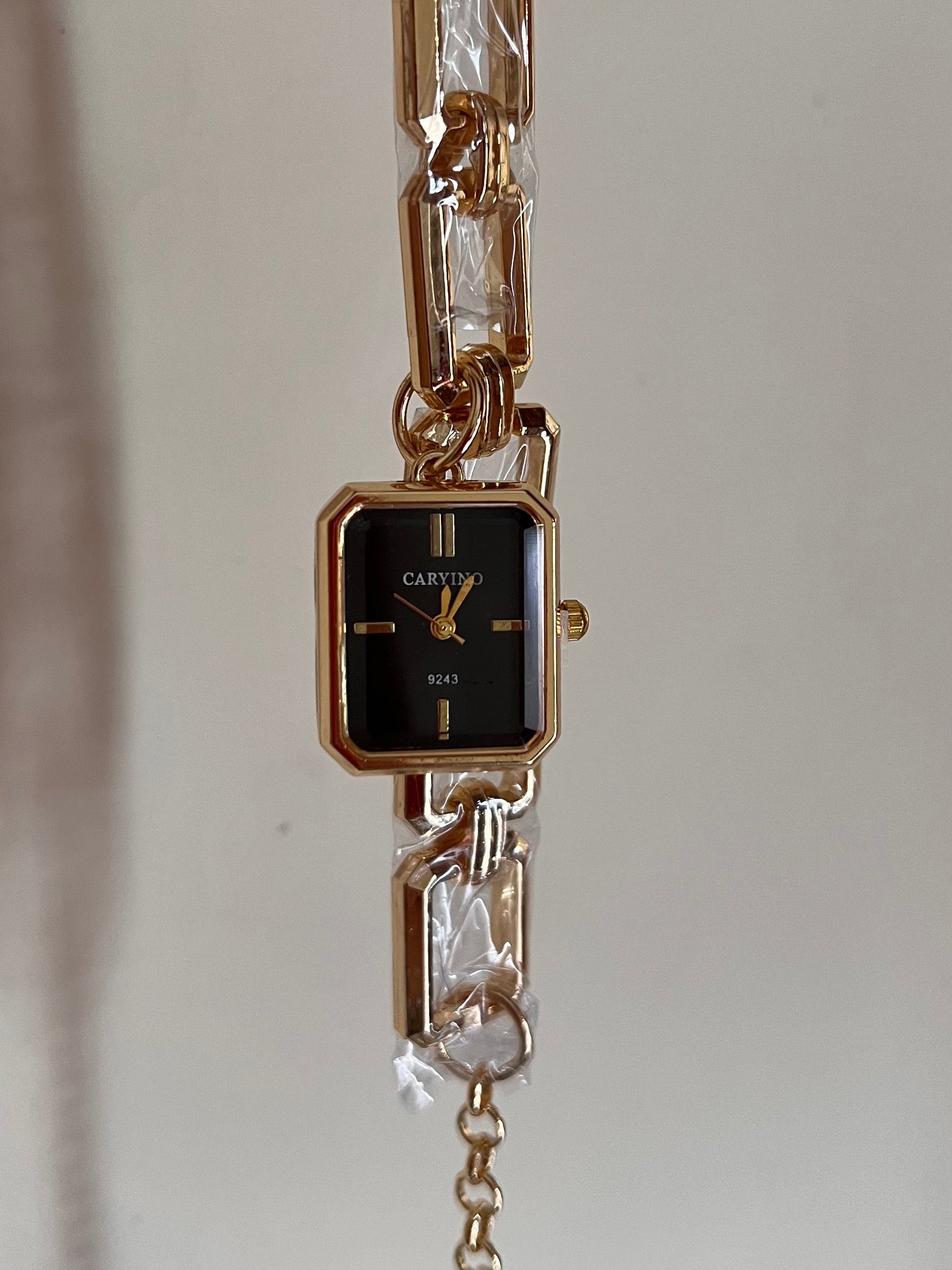 Black hanging dial watch