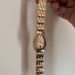 Snake golden dial watch